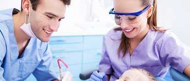 Dentists And Little Girl